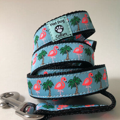 Dog leash with flamingo and palm tree on a light blue background