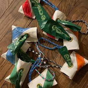 Repurposed sailcloth for dog bag holders to wrap around leash handle